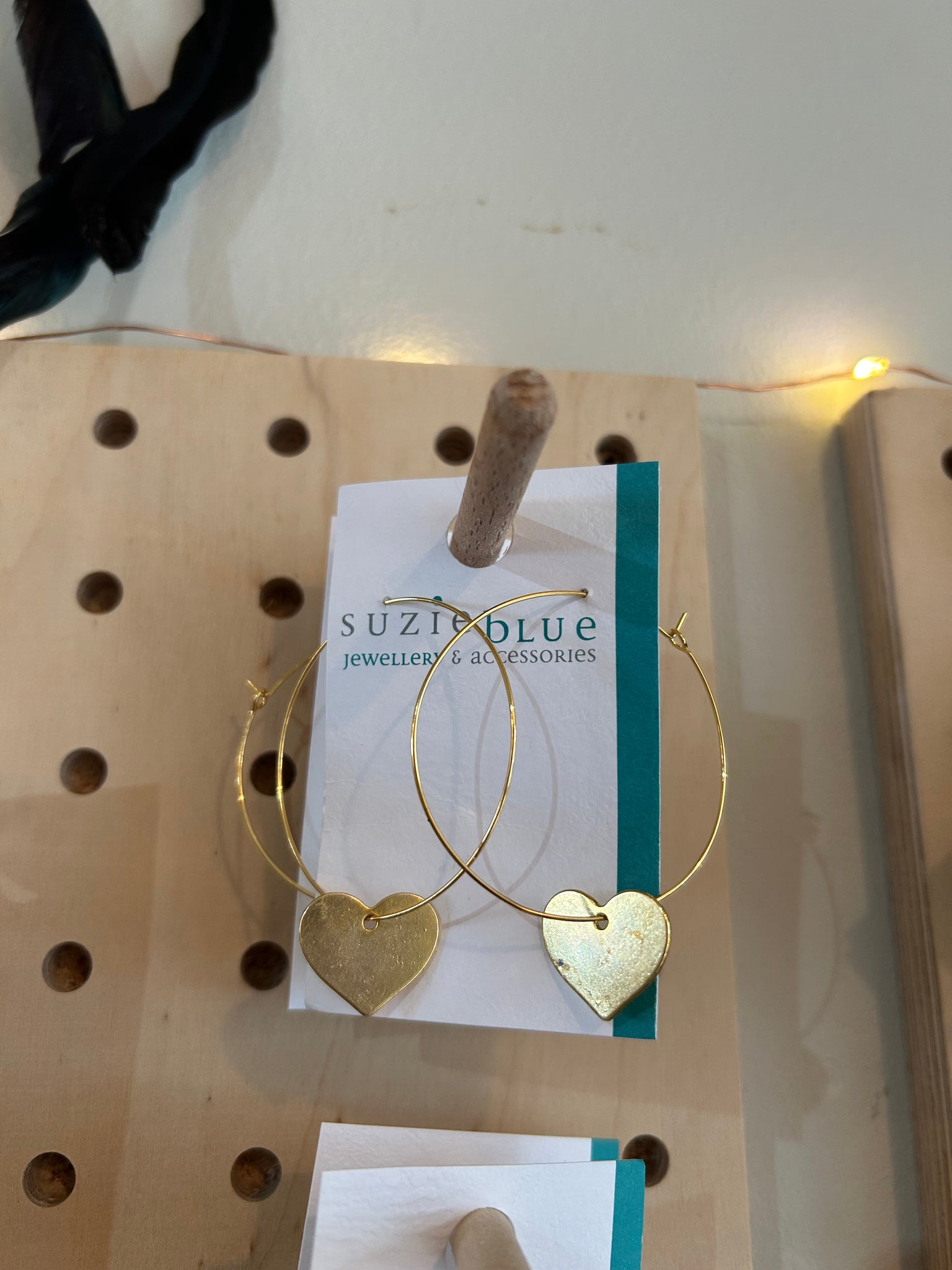 Gold hoop with heart